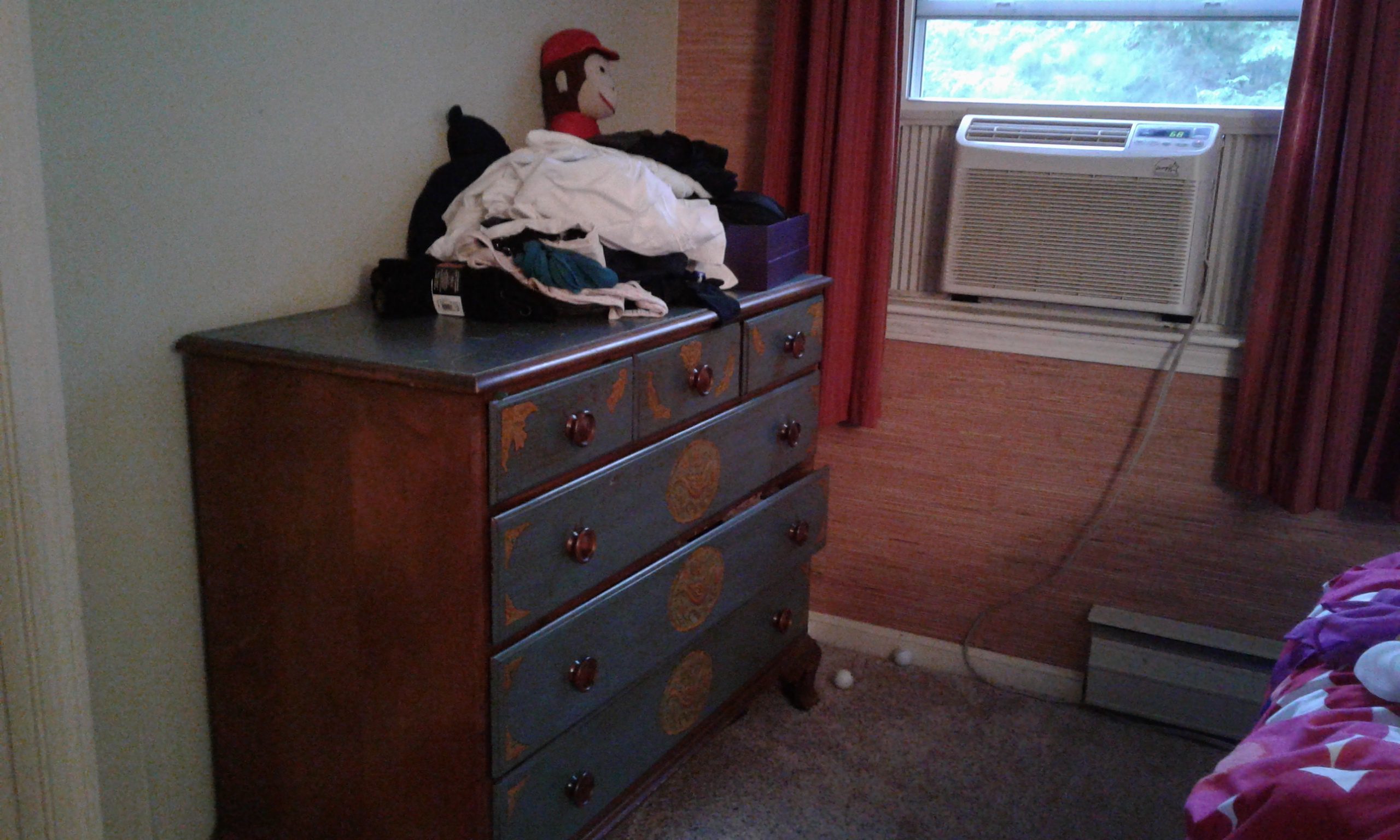 The dresser before we cleared its clutter