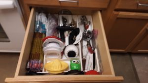 The kitchen drawer, with clutter cleared, and contents easily seen and reached - with help from De-clutter Me!