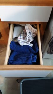 The towels drawer before help from De-clutter Me!