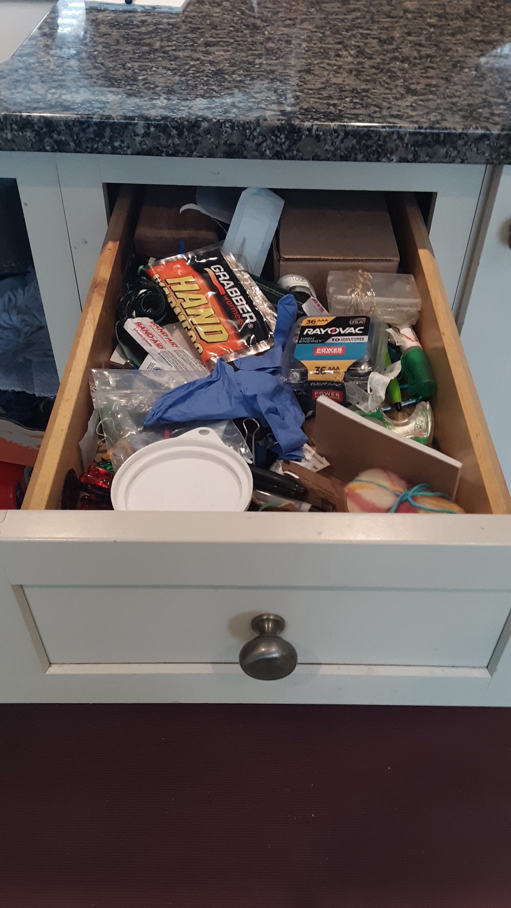 The first kitchen junk drawer before we cleared its clutter